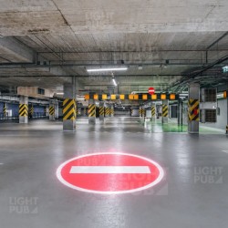 Projecteur lumineux au sol Sens Interdit pour parking souterrain